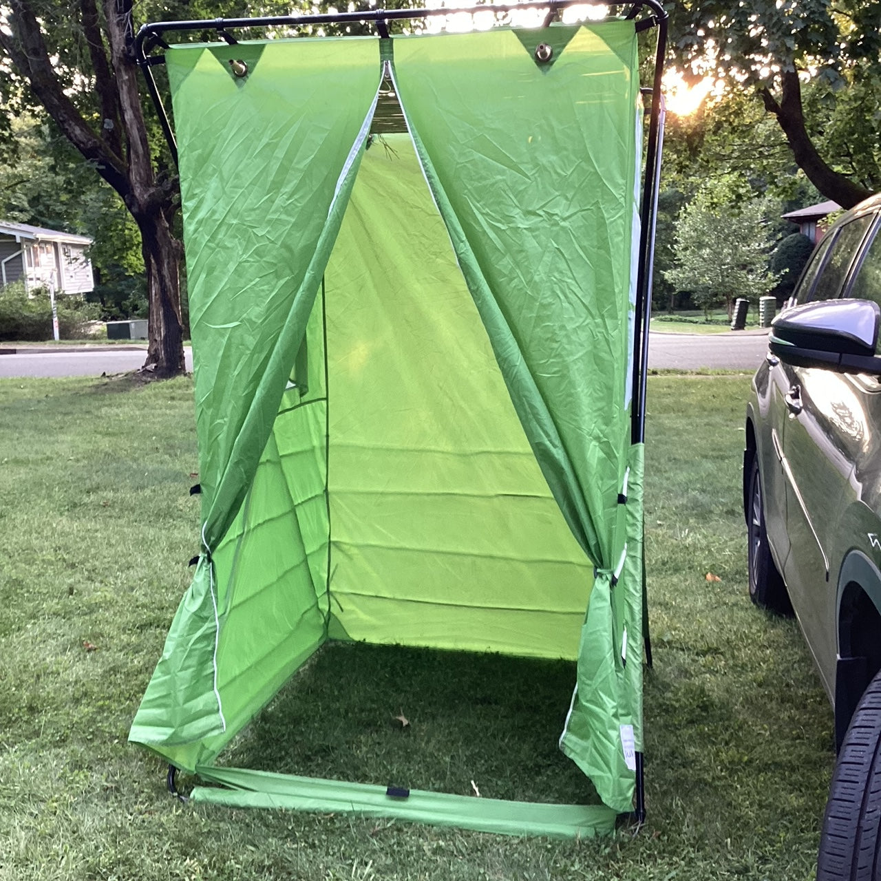 Pop-up travel sukkah set up on grass